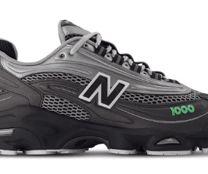 nb-1000-lime-leaf-side: Profil — srebrno-szare panele, detal zielonego logo